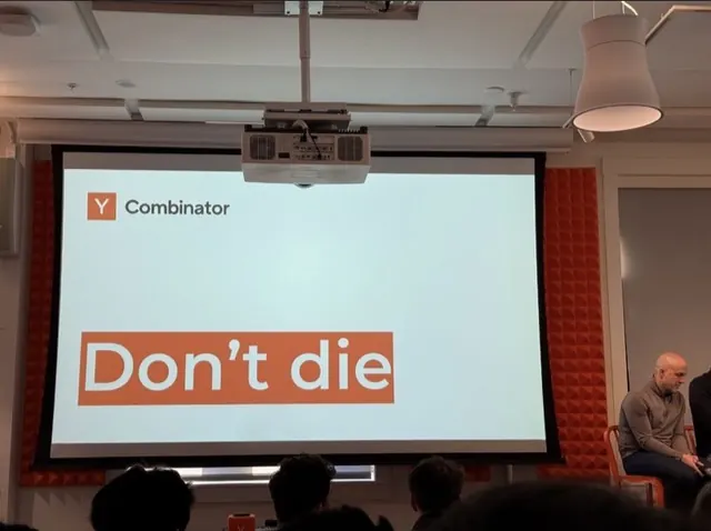 a y combinator slide that just says don't die